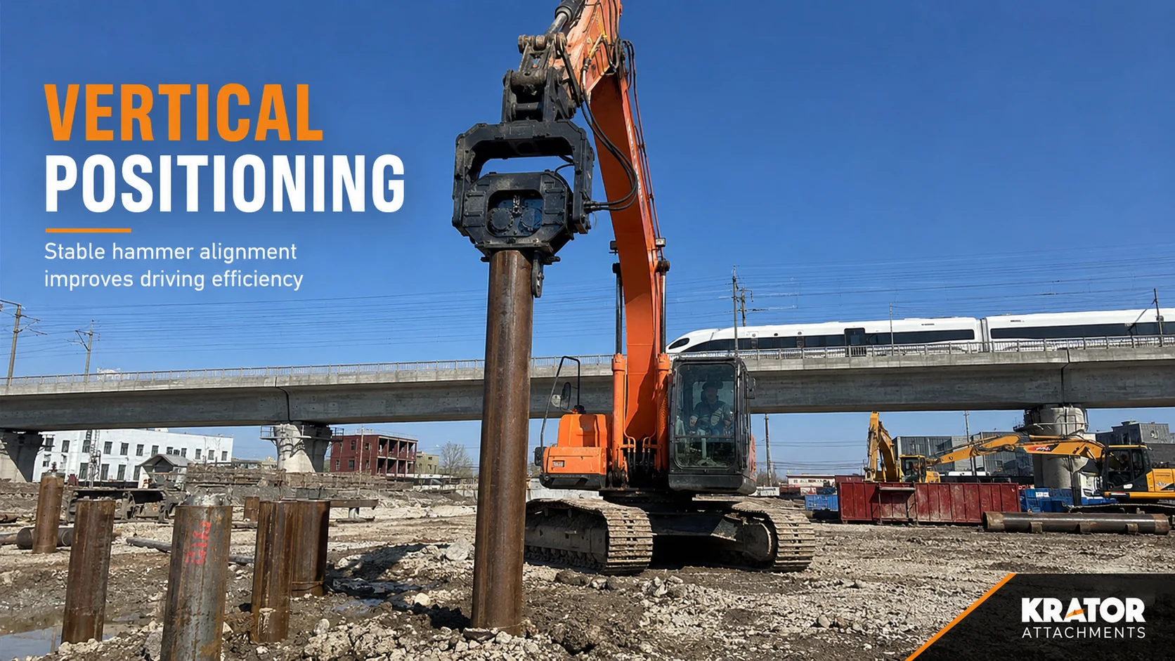 Top-clamp vibratory pile hammer aligned above a vertical steel pile